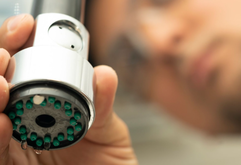 Image showing a professional fixing a broken door handle and inspecting an electrical panel.